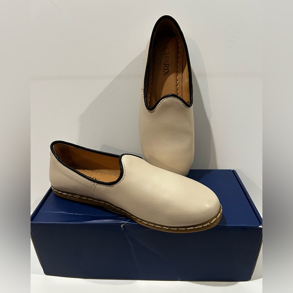 Excellent preowned condition Charix slip ons, cream with black trim, size 37